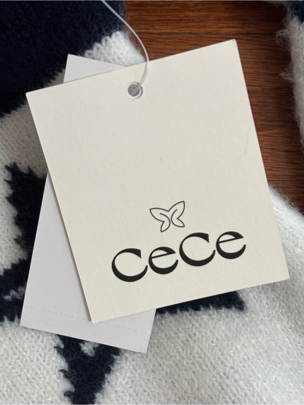 CeCe White Crewneck Sweater with Black Stars & Red Ski Stripe - Picture 6 of 8